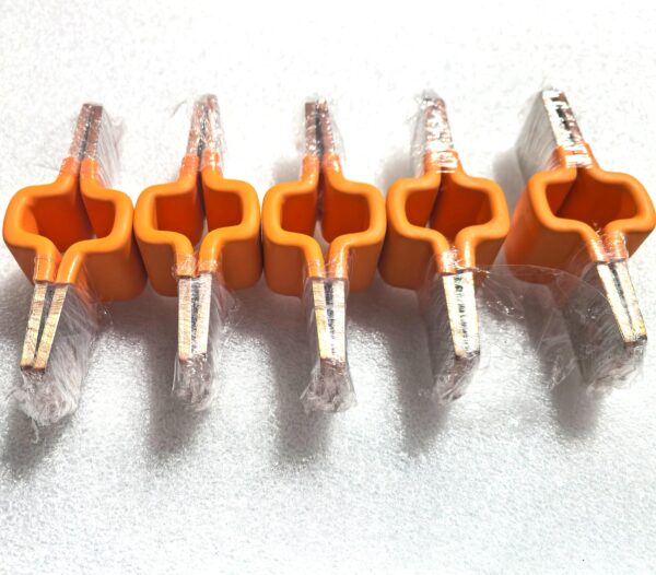 Overmolded copper busbar connector featuring stacked copper conductors, flat metallic contact ends, and an orange insulating body. Designed for electrical connections in battery assemblies, with custom configurations for OEM integration. Overmolded copper busbar connector featuring stacked copper conductors, flat metallic contact ends, and an orange insulating body. Designed for electrical connections in battery assemblies, with custom configurations for OEM integration.