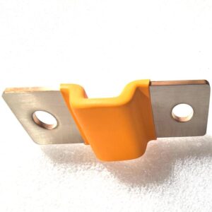 Overmolded copper busbar connector featuring stacked copper conductors, flat metallic contact ends, and an orange insulating body. Designed for electrical connections in battery assemblies, with custom configurations for OEM integration.